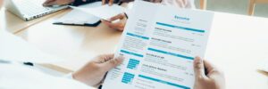 person holding a resume